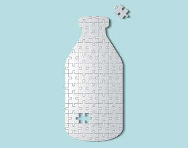 Puzzle of a glass bottle of milk