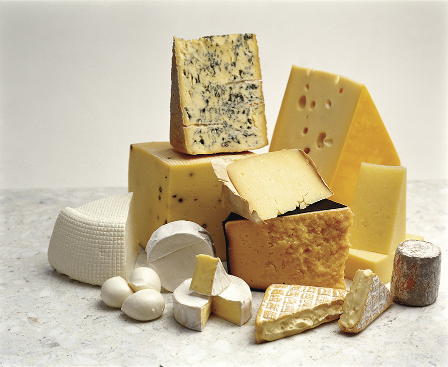 Pile of cheese varieties