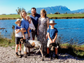 John Kelly and family, dairy farmers, outdoors, Tasmania