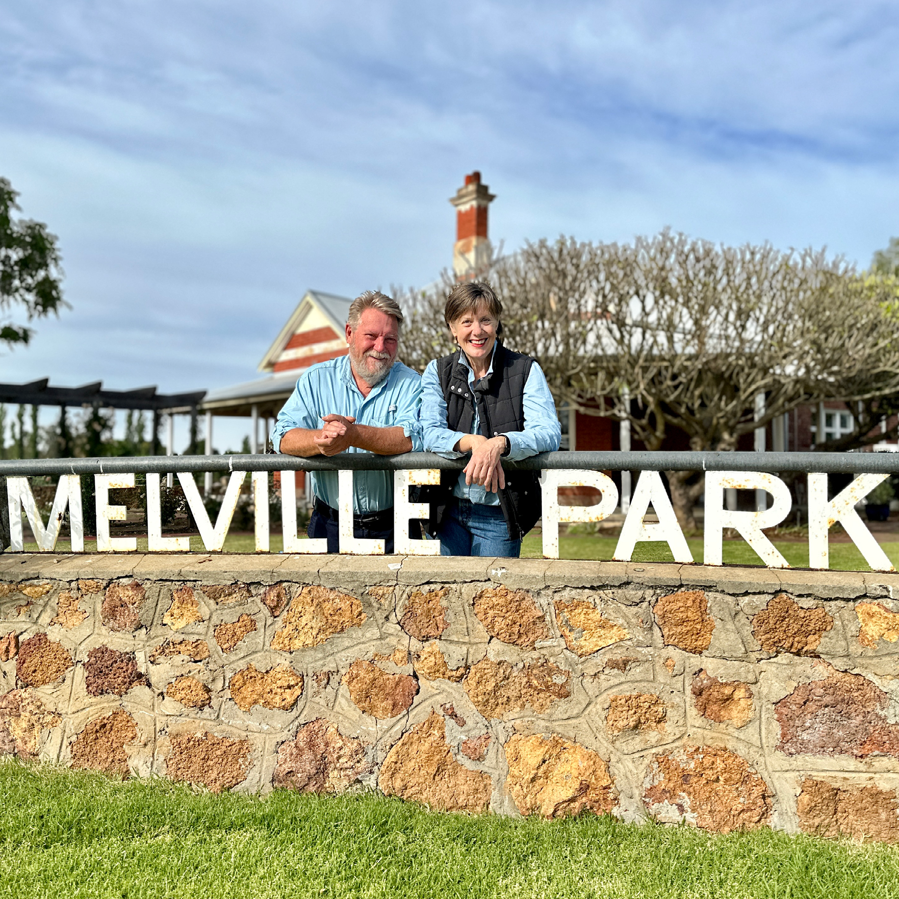 Custodians David and Barbara stand outside the Melville Park homestead.