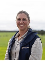 Photo of Bonnie Ravenhill standing outside in a paddock.
